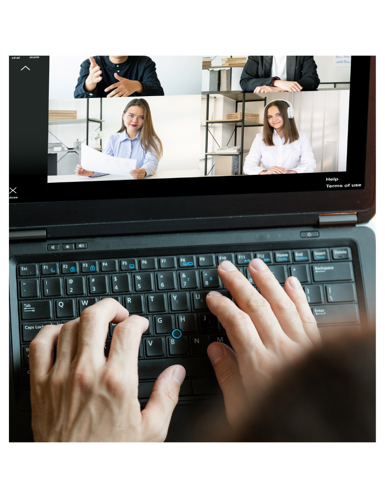 Image depicting four people on a zoom chat on the computer.